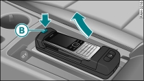 Mobiltelefon aus Adapter herausnehmen